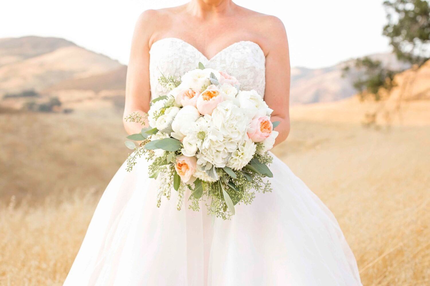 Bride with bouqyet at Higuera Ranch
