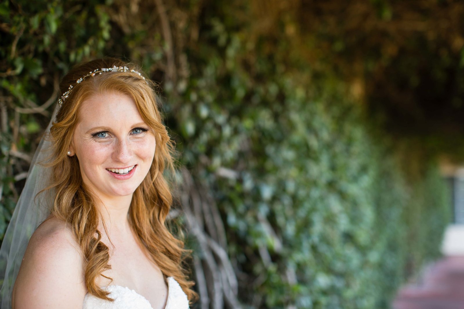 bride smiling at the camera at Heritage House in Arroyo Grande