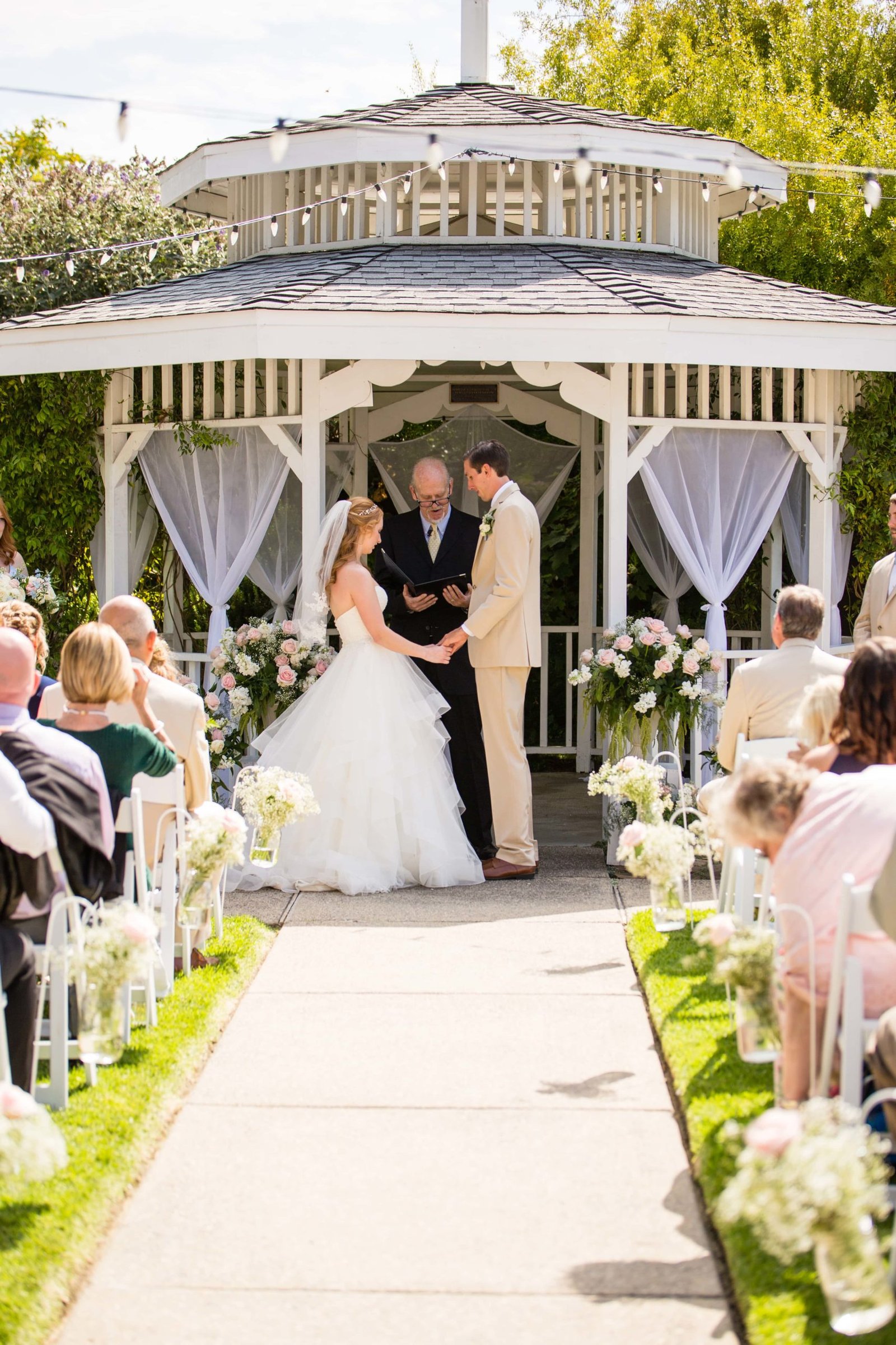 Bride and groom standing at the altar at Heritage House in Arroyo Grande