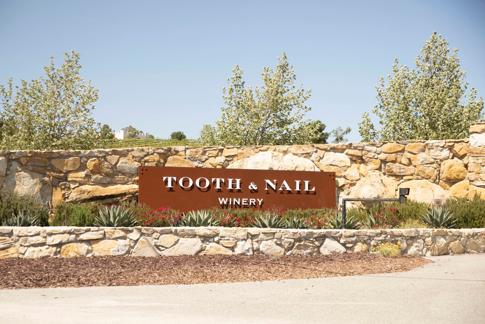 Tooth and Nail Entrance sign