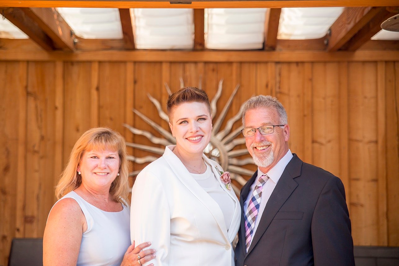 Bride with her parents at Roblar Winery in Santa Ynez, CA 