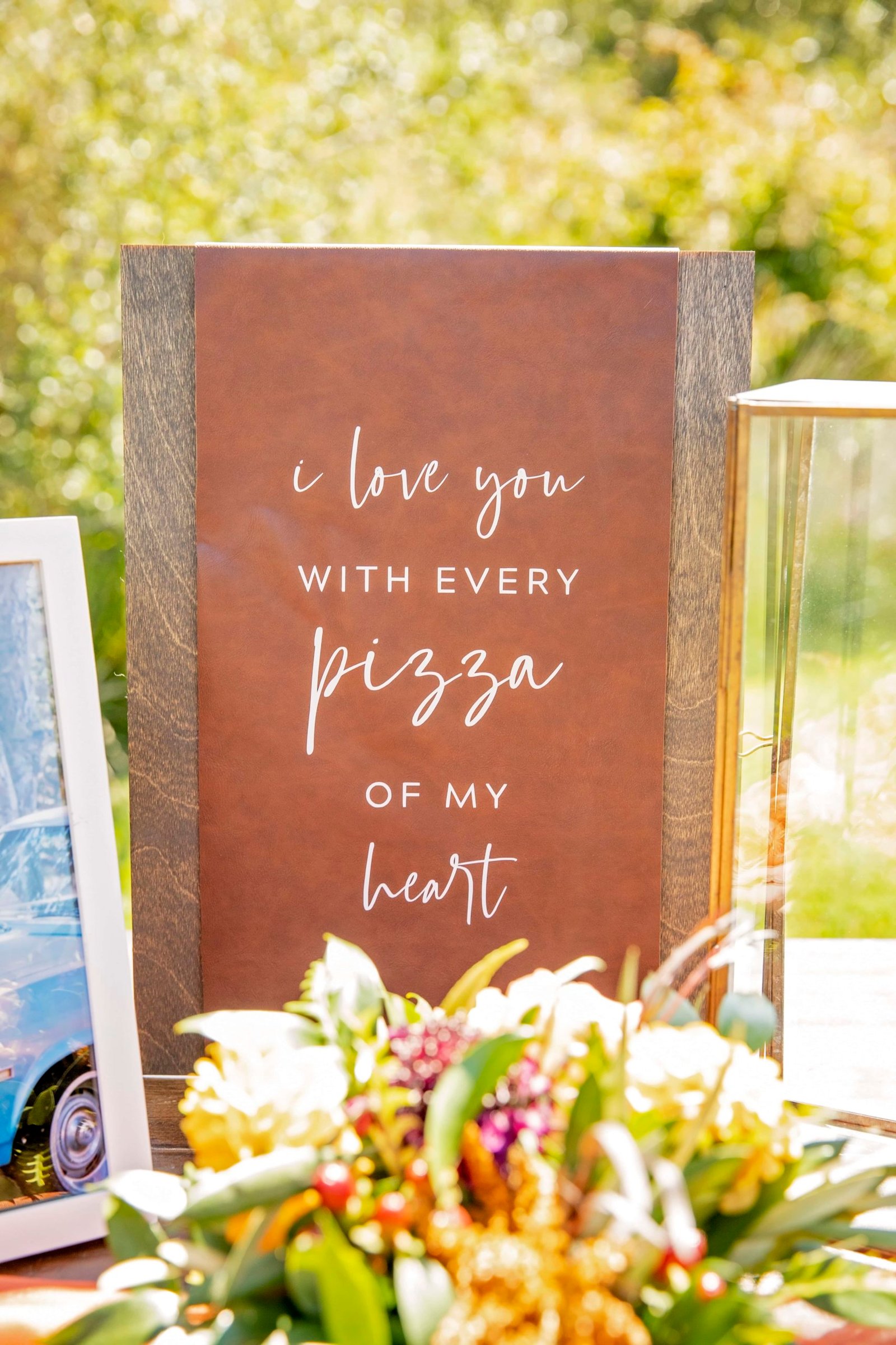 I love you with every pizza my heart sign at a wedding at Loma Grande Ranch