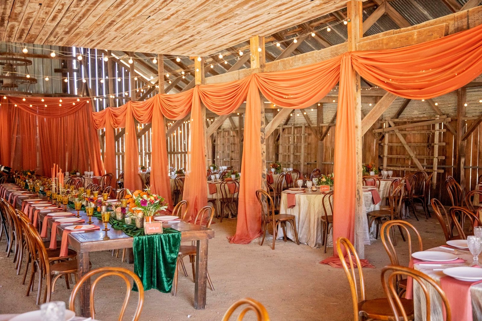 Interior of the barn decorated for a fall wedding at Loma Grande Ranch
