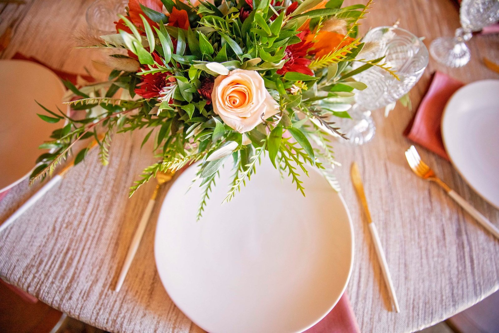 place setting at a reception in the barn at Loma Grande Ranch