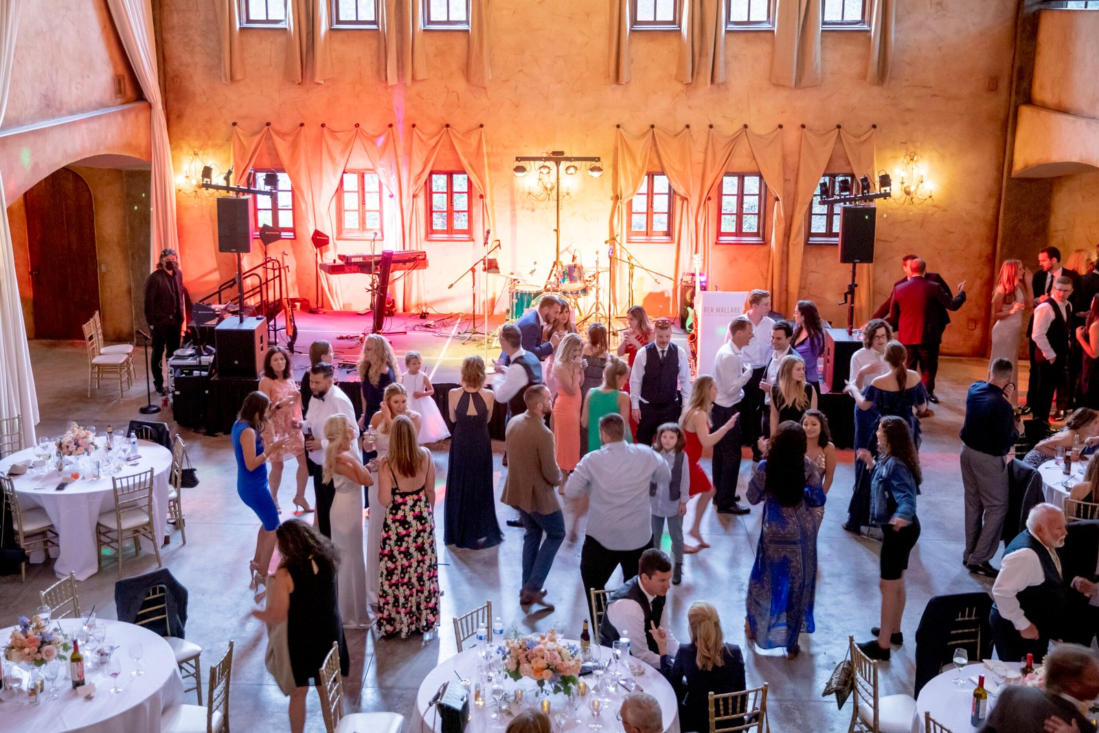 wedding guests dancing in the grand ballroom at villa loriana