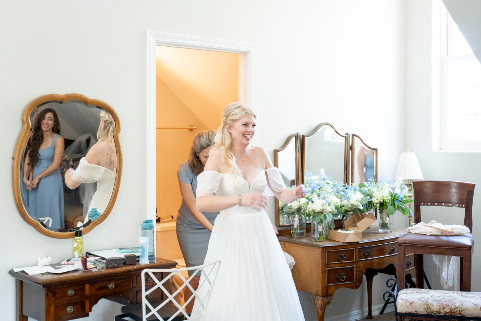 bride greeting her bridesmaids for a first look