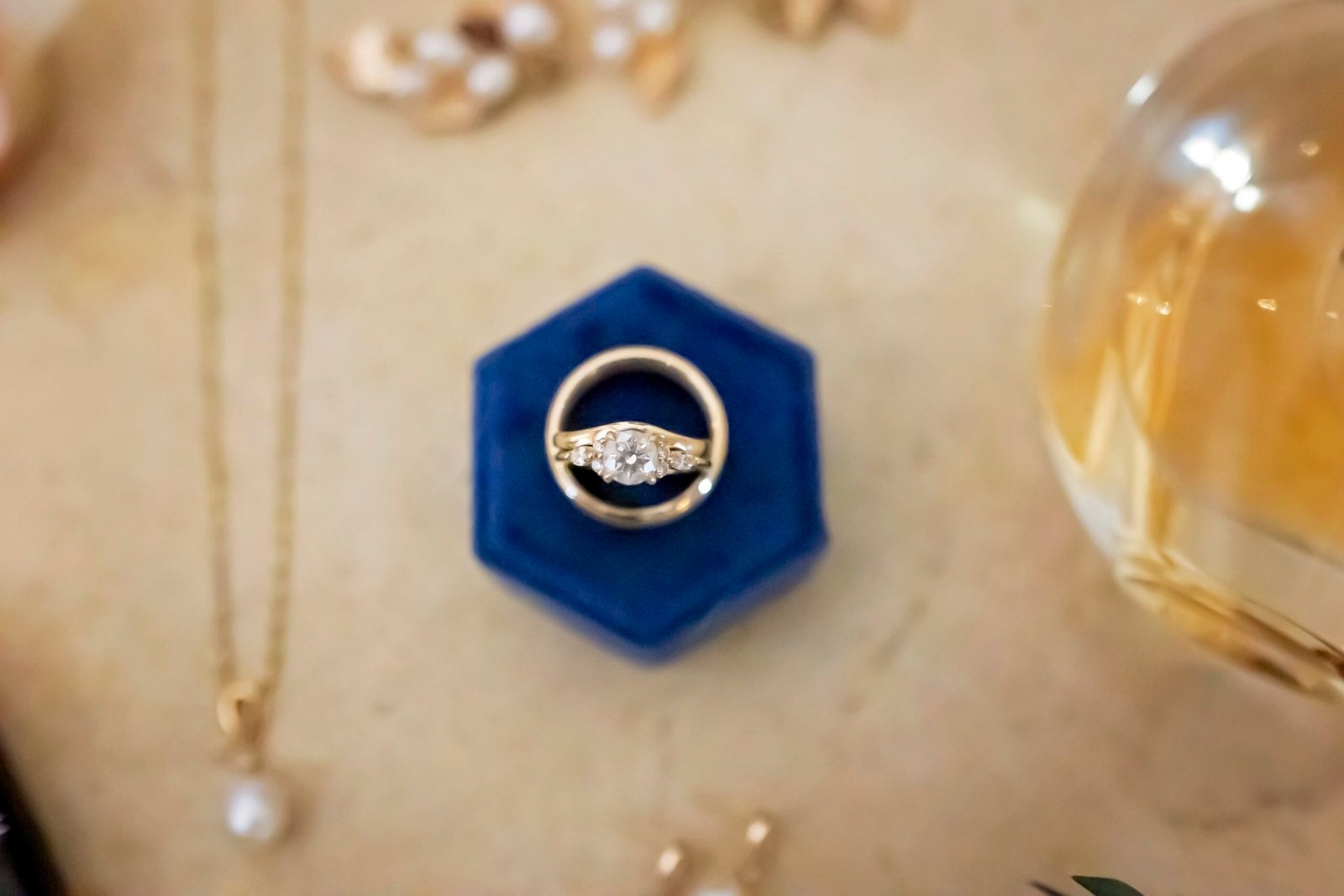 wedding ring set in a blue ring box
