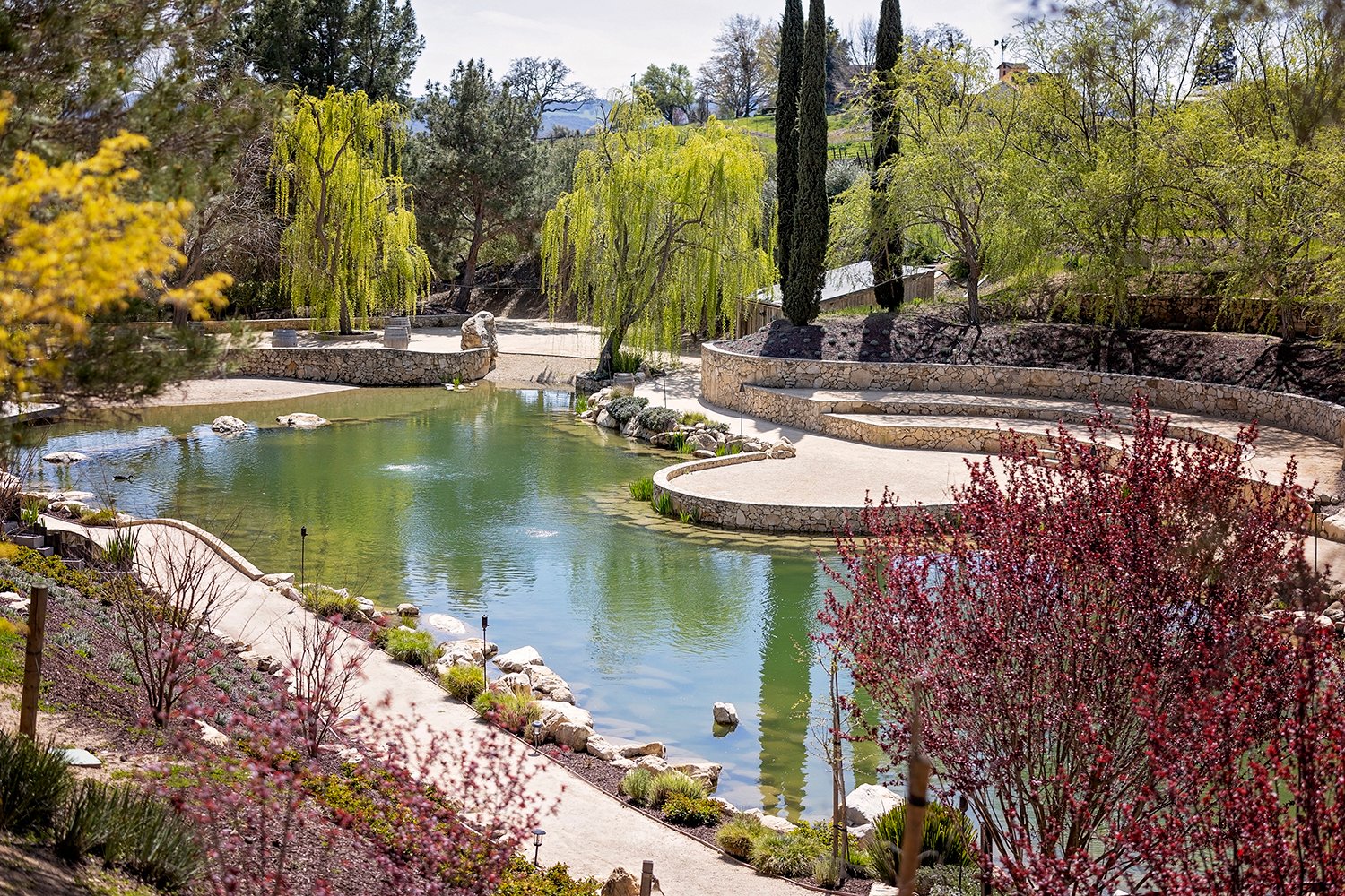 pond surrounded by terraces and amphitheater seating
