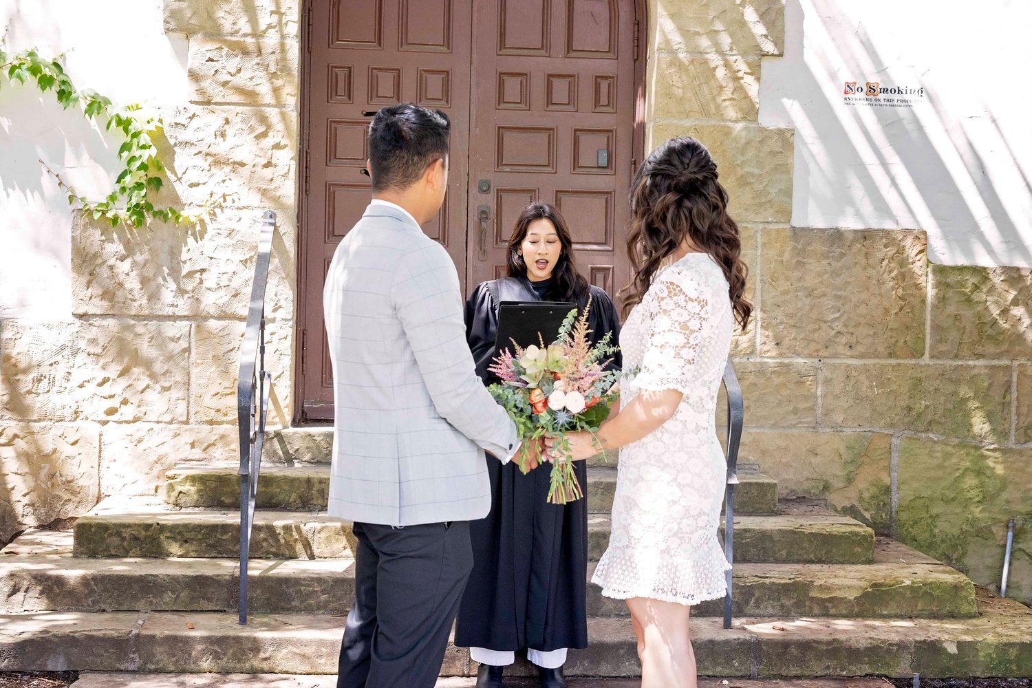 Justice of the peace performing an elopement ceremony at the Santa Barbara Courthouse