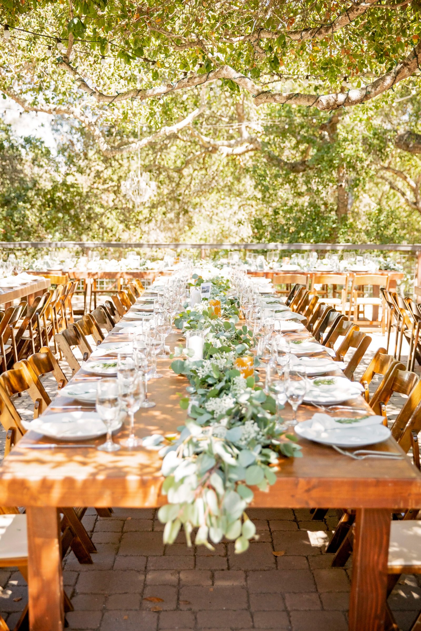 farmhouse tables decorated for a wedding