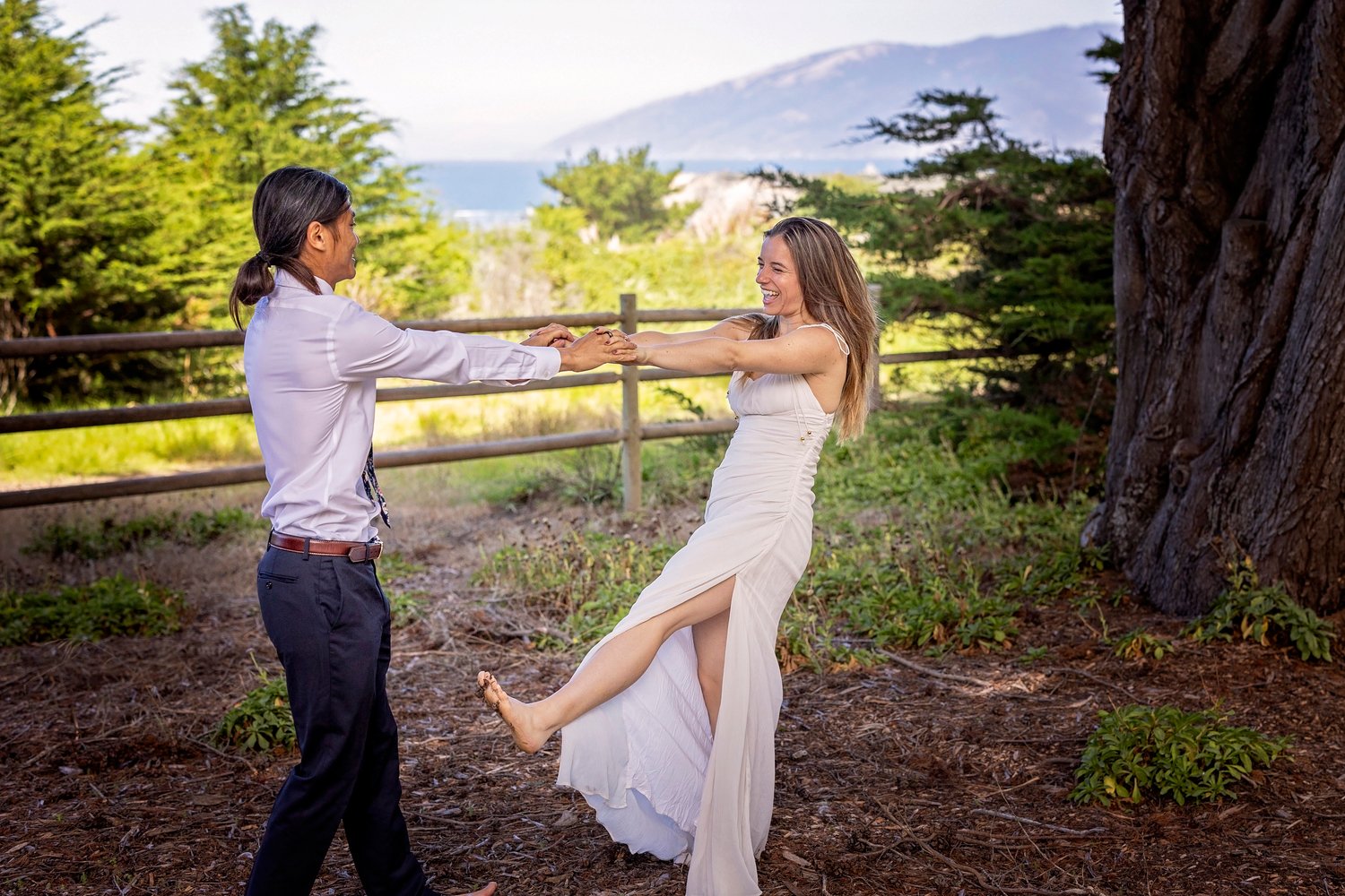 couple dancing in a wooded area of Sand Dollar Beach