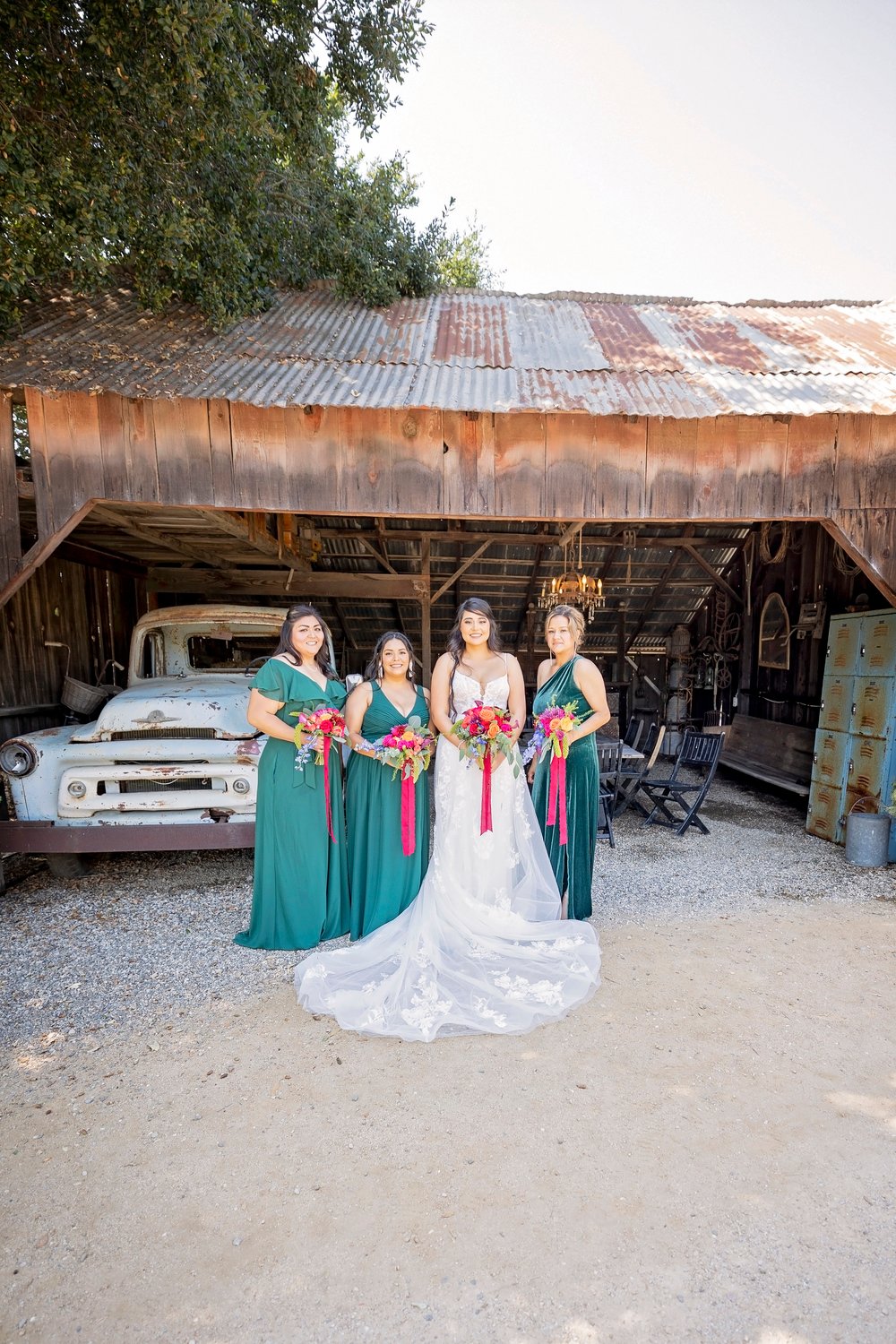 bride standing with the bridesmaids
