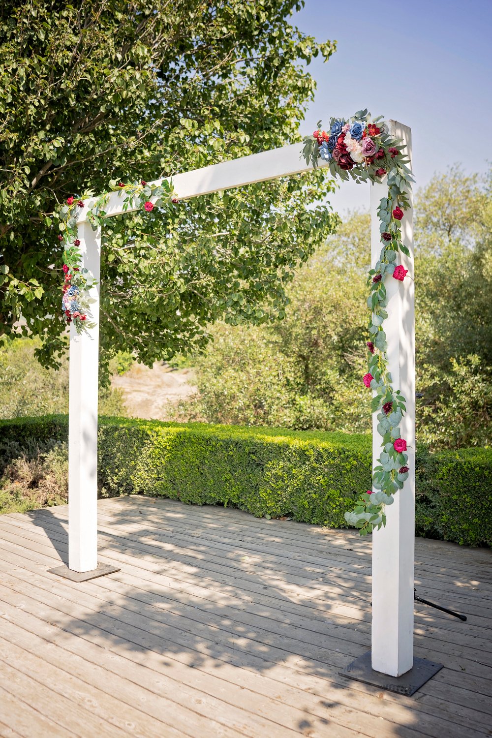 white arch with flowers for a wedding