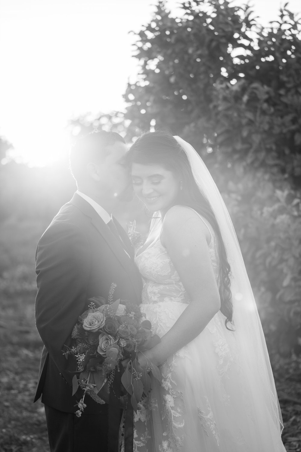 bride and groom during sunset photos