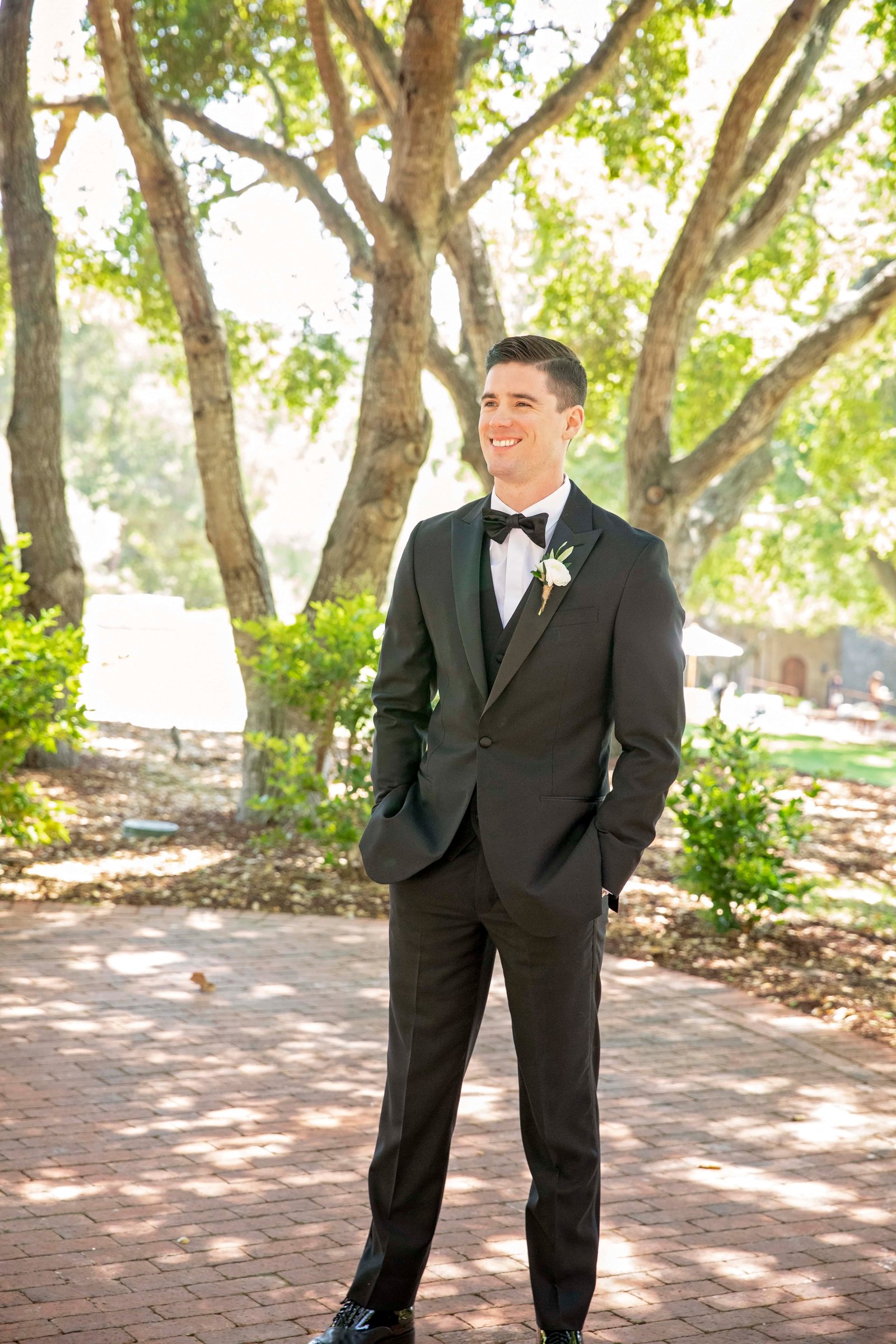 groom standing for a posed portrait