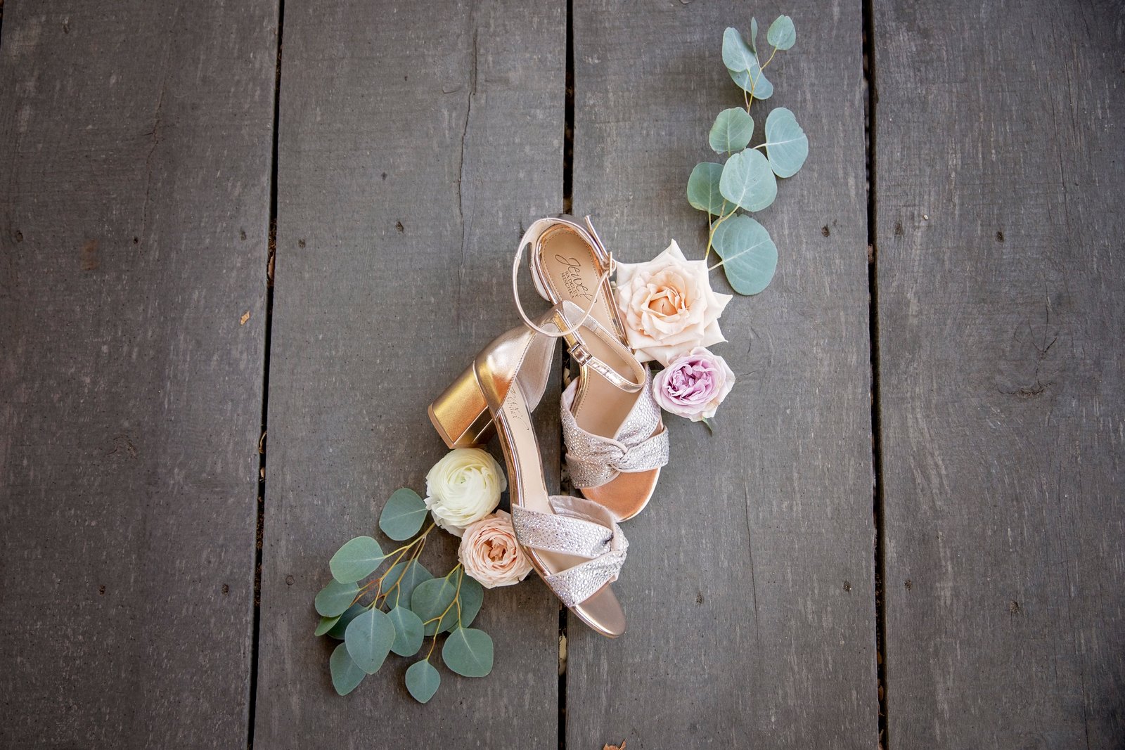 bride's shoes with flowers