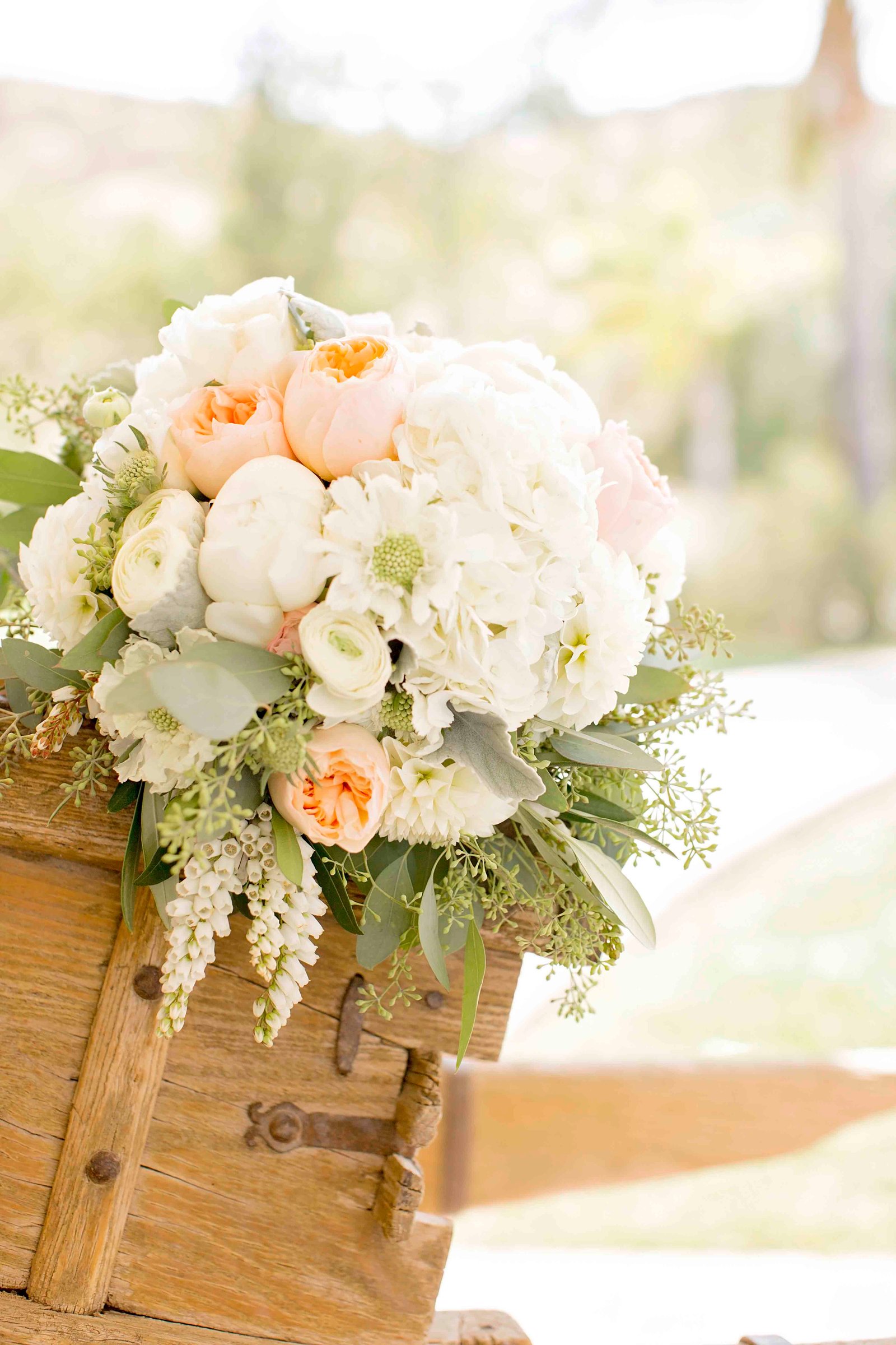 bridal bouquet on a wooden cart